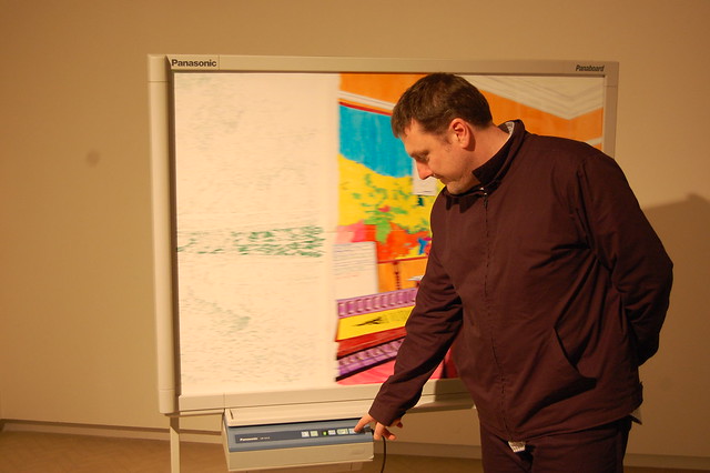 glenn tries to get a print from raquel's whiteboard