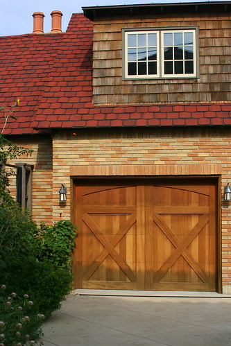 beautifully detailed driveway and garage doors
