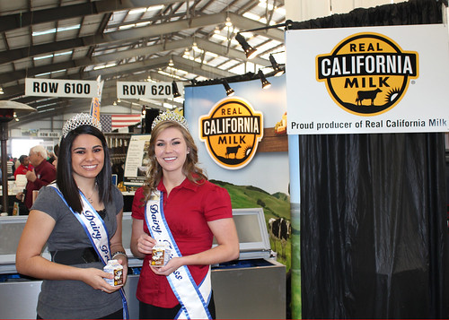 Dairy princesses hand out chocolate milk boxes at the Real California Milk booth, a popular visitor stop in the Dairy Barn at the 2011 World Ag Expo.