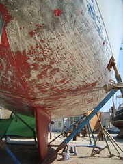 a scraped hull with a newly painted keel