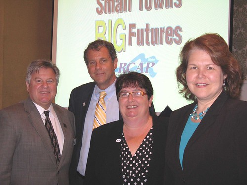 (Left to right) Ohio Rural Development State Director Tony Logan, Sen. Sherrod Brown, Deb Martin, Great Lakes RCAP Director and Judith Canales, USDA Rural Development Administrator for Business and Cooperative Programs at the Ohio RCAP conference.  