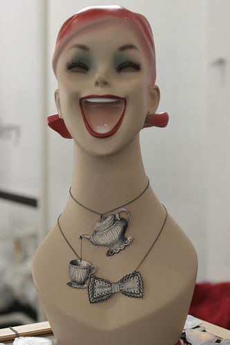 One of those mannequins and the cutest little teapot necklace