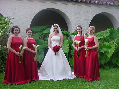 Red bridal bouquet and white calla lily bouquets by Dream Designs Florist