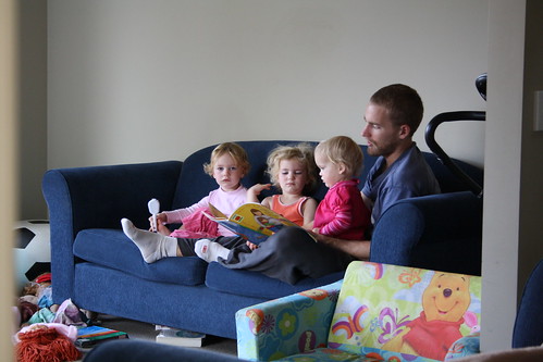 Daddy and Girls reading