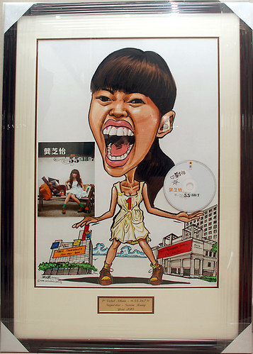 Caricature of Singapore singer Serene Koong 龚芝怡 with cd and album cover in frmae with metal engraving plate