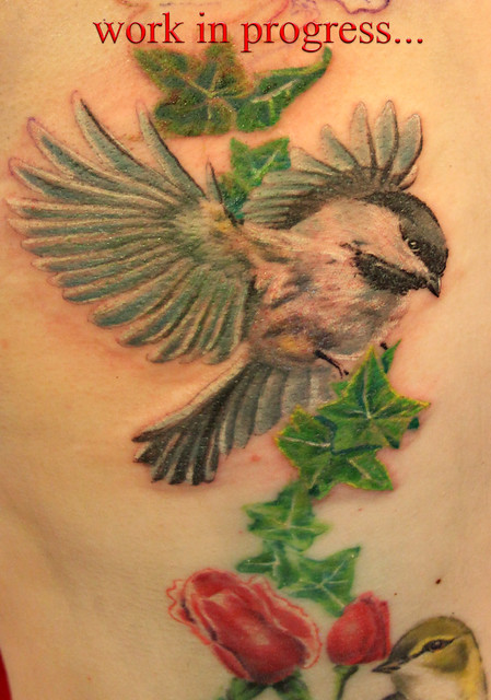 bird with flowers and ivy tattoo by Mirek vel Stotker
