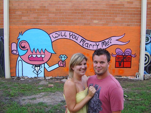 Shannon proposed to Jessica in front of graffiti art by Ack that included a
