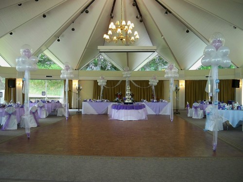 Purple Flowers on the Wedding Cake photo by Salicia Purple Themed Wedding 