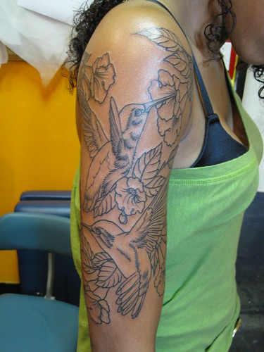 Outlining for flowers and leaves armpiece Custom art to be completed in a