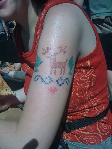 Design Stitch Tattoo on Women Arm