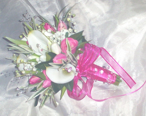  leaves pink silver gems and finished with a pretty pink bow