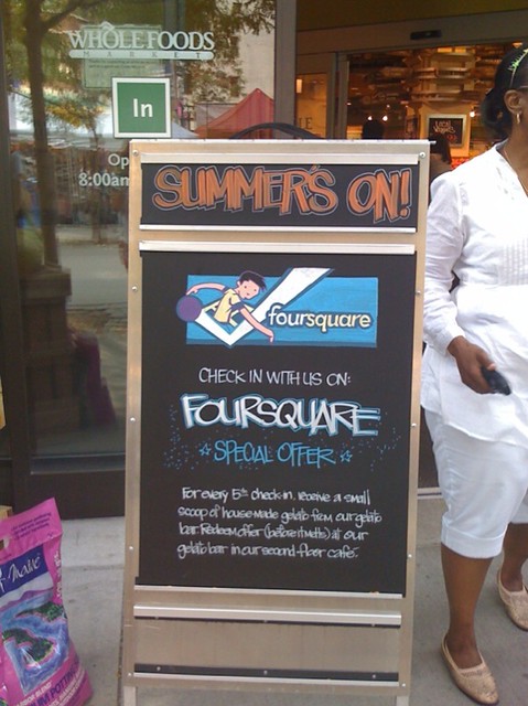 Whole Foods running @foursquare blackboard ads outside their stores = amazing