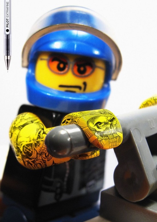 Thumb Lego toys with tattoos (ad for Pilot Pen)