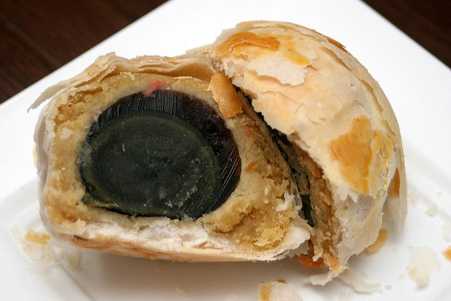 Pastry with century egg in mixed nutty paste