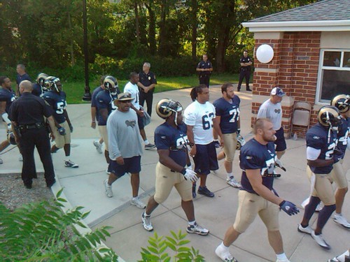 Chris Long leads a group of Rams onto Lindenwood field
