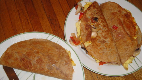 Quesadilla with sofrio, mushrooms, red bell peppers, egg omelet and Chedda cheese
