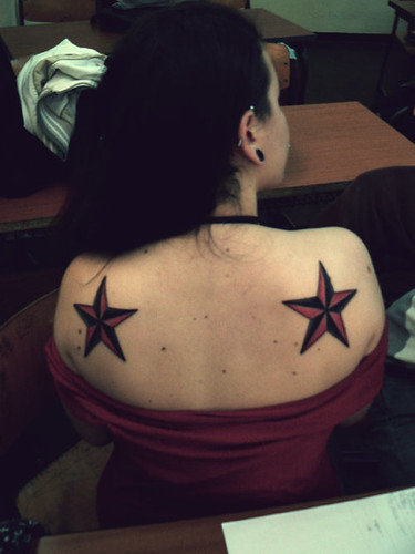 The Best Star Tattoo on Upper back Girl 