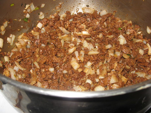 Sauteeing Homemade Vegan Sausage with Onions
