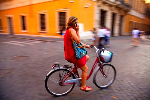 Multi-tasking Biker in Rome