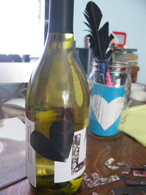 cut out magazine clippings and tape to bottle.