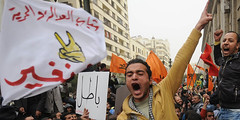 Egyptian opposition activists shout slogans outside the high court in downtown Cairo on December 12, 2010 during a demonstration against the results of the general election which they say was marred by fraud. by Pan-African News Wire File Photos