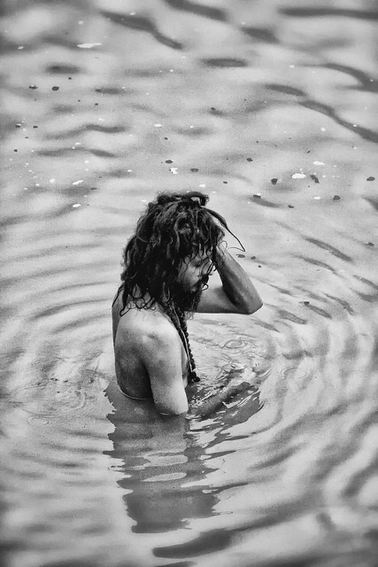 A Saddhu Bathes In The Ganga River