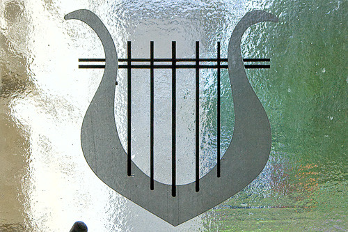 Saint Martin of Tours Roman Catholic Church, in Lemay, Missouri, USA - window detail of lyre