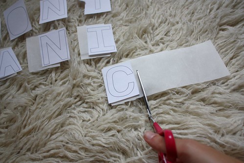 Step 1: Cut Wonder Under to Size of Paper Letters