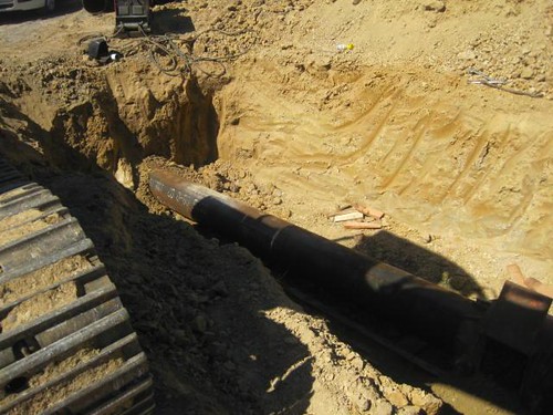 A  water line is being bored under a road.  Pipe installation is expected to be completed by Nov. 3. 