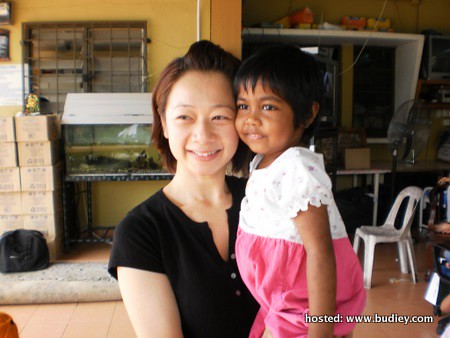 Angie Chee of KLEC with a girrl at Rumah Titian Kasih