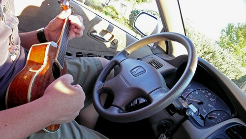 Playing guitar while driving