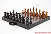 The Wooden Chees Pieces And Chess Board
