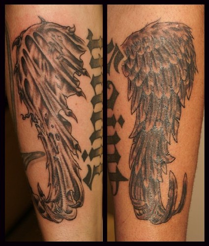 Wings tattoo by Chris Posey