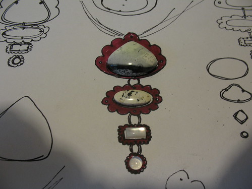 red enamel and stones....