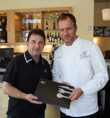 Chef Berasategui gives BasqueStage documents to Chef Norin