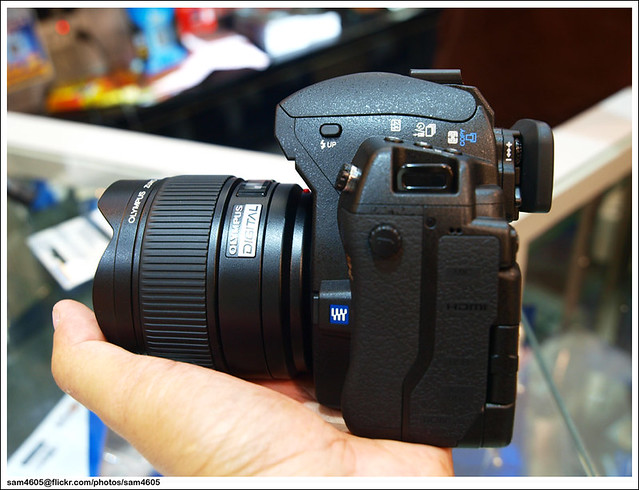 New Olympus E-5 + 8mm FE lens in my hand
