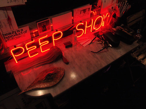 What, you mean you don't have a neon "peep show" sign in your apartment?