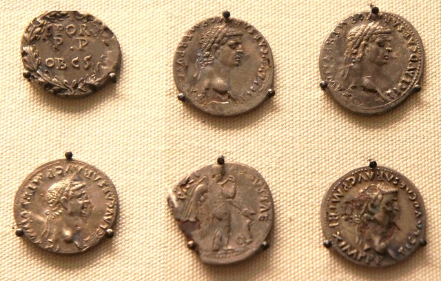 Suffolk forger's hoard of plated coins, detail of 6 coins various types of the emperor Claudius