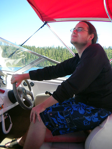 Daniel is driving a boat
