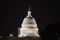 The United States Capitol Alight At Night in W...