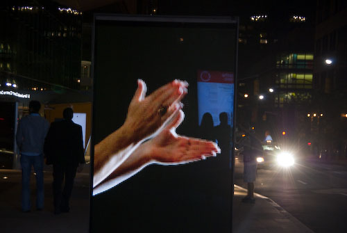 Night outside Lincoln Center with an advertisement
