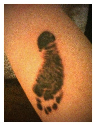 baby footprints tattoo. Baby footprint tattoo