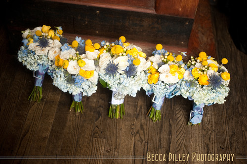 blue and yellow wedding flowers with broches for dinkytown wedding 