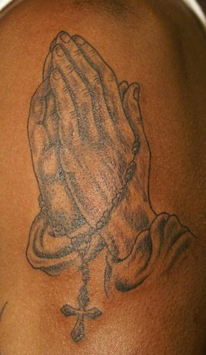 Praying hands rosary tattoo by Southside Tattoo & Piercing