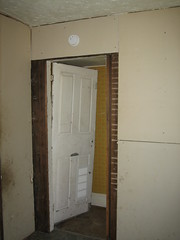 Basement door, between south and center wing