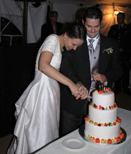 alyssa and carl cutting cake 2010