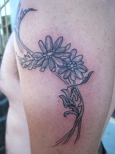 Daisy tattoo. Custom tattoo by Kai Smart Primary Concepts tattoo- Davis