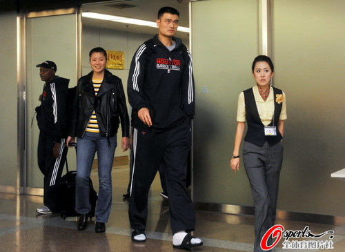 October 12th, 2010 - Yao Ming arrives at Beijing with wife Ye Li for the 2010 NBA China Games