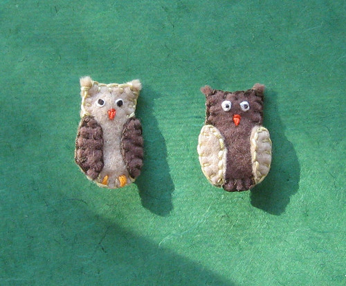 Two owl pins