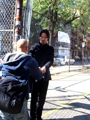 Keanu Reeves giving an autograph